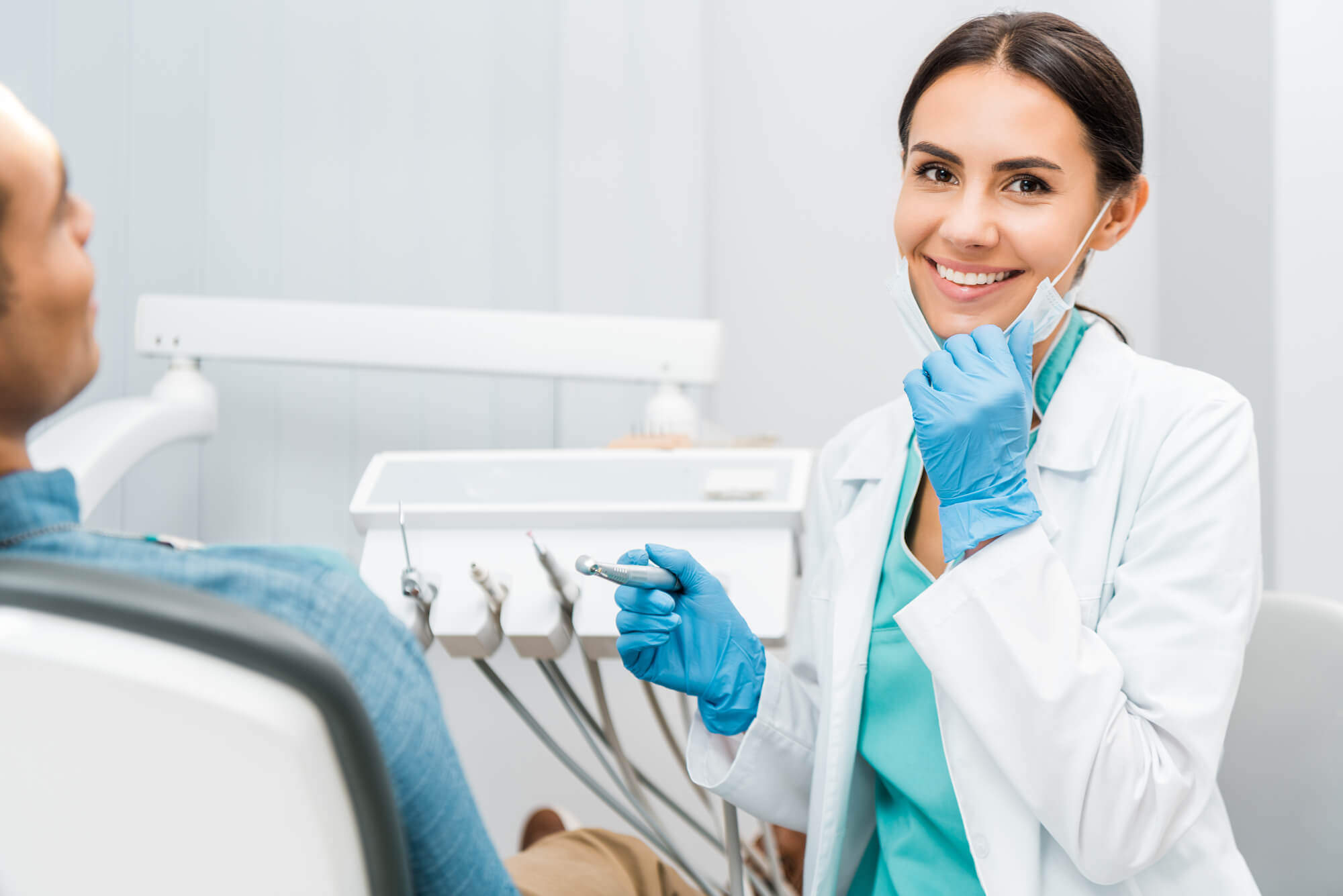cosmetic dentist in Simpsonville, SC, about to perform a procedure to her patient