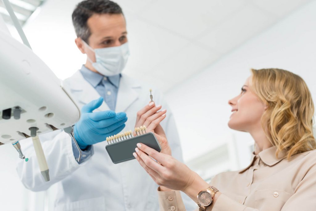 woman choosing her dental implants in Greenville, SC