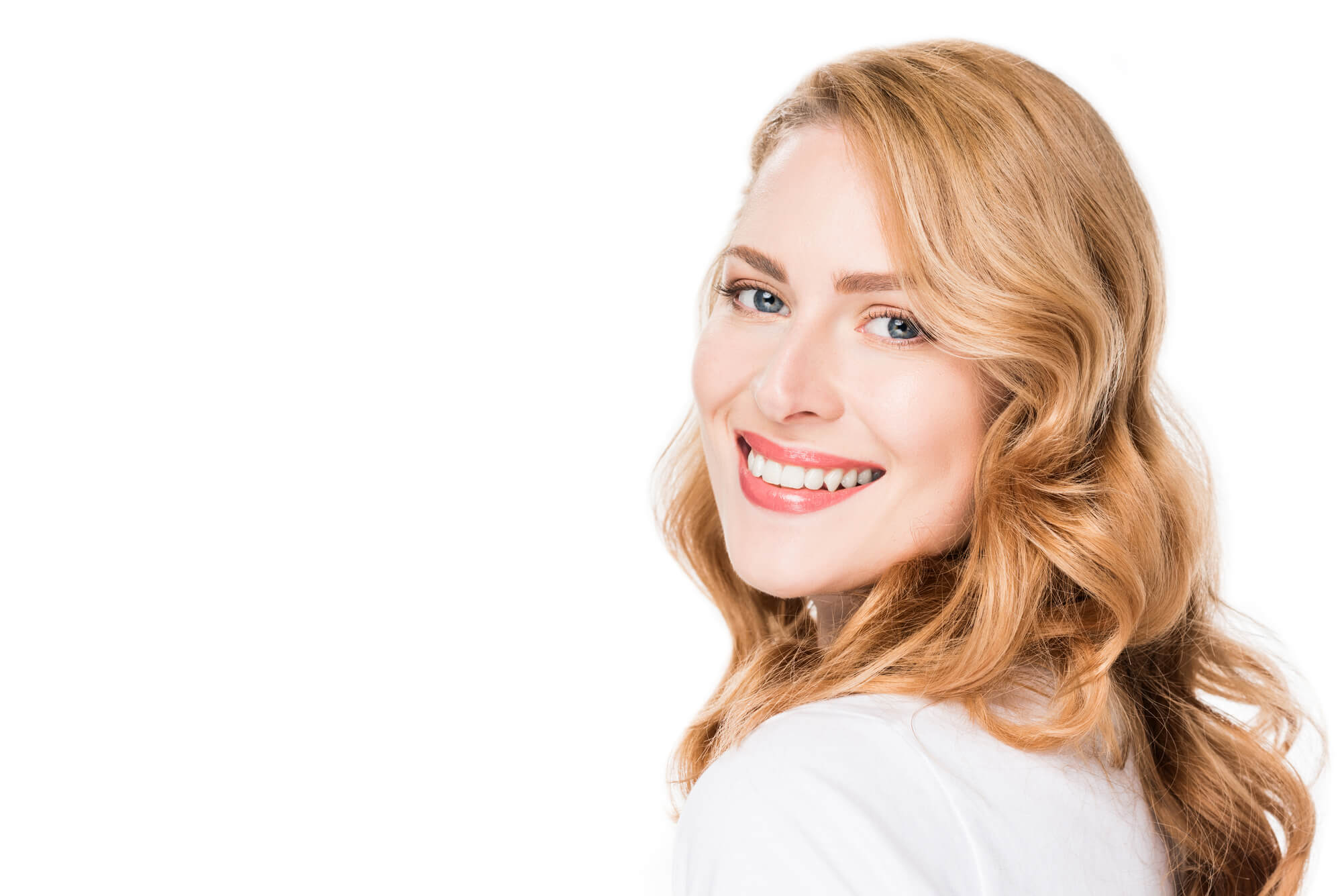 pretty woman smiles after teeth whitening in Greenville SC